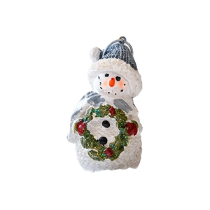 Cute resin Christmas snowman figurine with blue knitted hat and holiday wreath