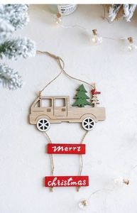 Detail of wooden Christmas truck ornament with Merry Christmas sign and warm festive decor