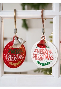 Detail of red and white metal Christmas door signs with bells and Merry Christmas relief