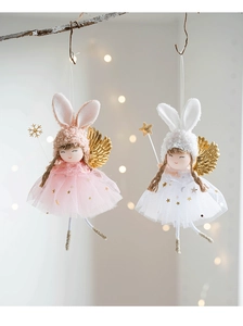 Detail of pink and white plush angel bunny ornaments with mesh skirts and star wands