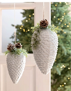 Detail of silver glitter pinecone ornaments with faux pine needles for Christmas decor