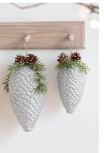 Silver glitter pinecone ornaments with natural pine needles and rustic twine hangers
