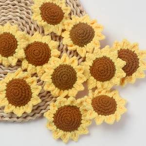 Handmade crocheted sunflower appliques for DIY crafts and accessories decoration