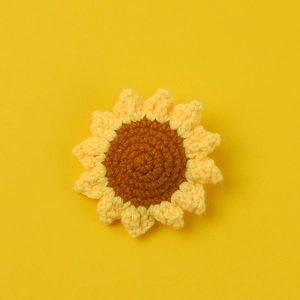 Handmade crochet sunflower with yellow petals and brown center for DIY accessories