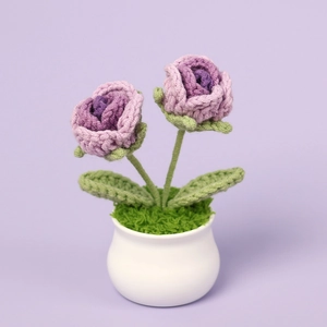 Handmade crochet purple rose flowers in a white ceramic pot for home decor and gifts