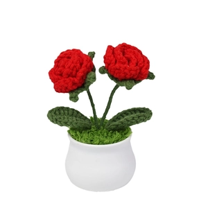 Handmade crochet red rose potted plant in white ceramic pot for home and desk decor