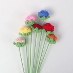 Close-up of handmade crochet roses with detailed knit textures in vibrant colors