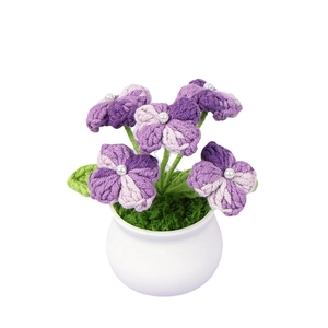 Handmade crochet purple flower potted plant with white ceramic vase and pearl center detail