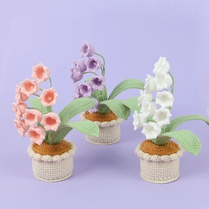 Handmade crochet Lily of the Valley potted plants in pink, purple, and white colors