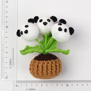 Handmade crochet panda potted plant with three heads and green leaves, 11cm height