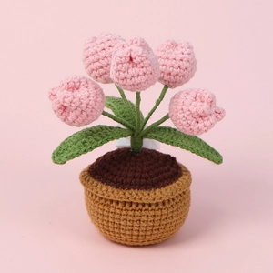 Handmade crochet pink tulip potted plant for home desktop decoration and Mother's Day gift