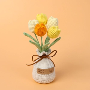 Handmade crochet tulip potted plant in white vase with Hand Made leather label