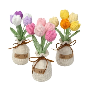 Handmade crochet tulip flower pots in purple, pink, and orange for home decor gifts