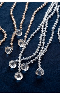 Detail of acrylic crystal beaded fringe with faceted pendants for Christmas tree decoration