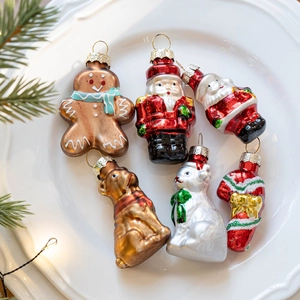 Set of 6 festive Christmas glass ornaments including snowman and nutcracker figures