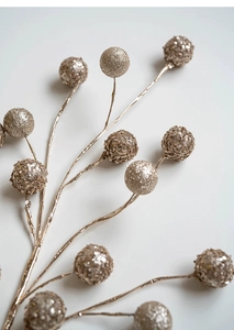 Close-up of champagne gold glitter berries and sequins for Christmas wreath decoration