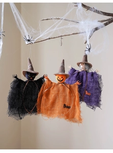 Halloween hanging ghost ornaments featuring pumpkin and witch designs on branches