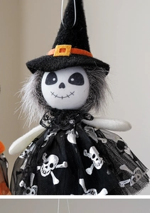 Detail of Halloween skeleton doll pendant with witch hat and black lace mesh skirt