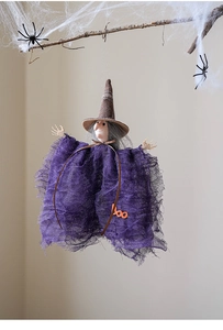Hanging Halloween witch decoration with purple mesh dress and Boo lettering detail