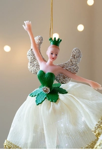 Detailed view of ballet fairy ornament with green crown and gold glitter wings