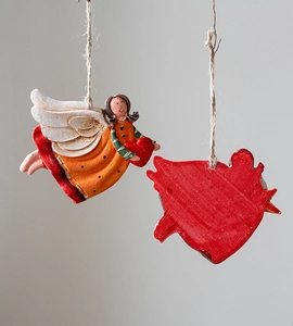 Detailed front and back view of vintage resin angel ornaments with rustic twine hangers