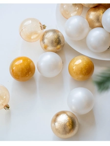 Detailed set of matte, glossy and glitter champagne Christmas ornaments on white background