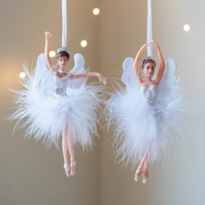 Two elegant white ballerina angel ornaments with feather skirts and wings for Christmas