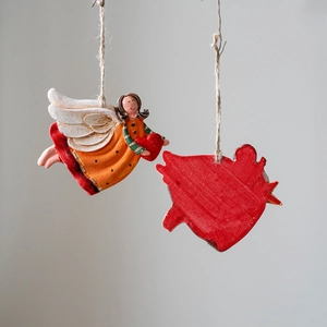 Vintage resin Christmas angel ornaments with white wings and red hearts on jute strings