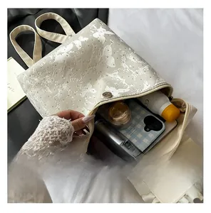 Detailed view of the mini backpack interior showing large capacity for daily essentials