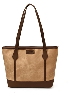 Brown canvas tote bag with fashion label and contrasting leather handles for women