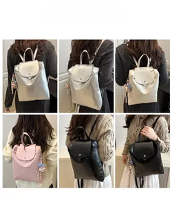 Dettaglio di zaini in pelle capienti nei colori argento, beige, rosa e nero trendy