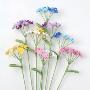 Detailed handmade crochet flower bouquet with pearl centers in vibrant assorted colors