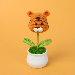 Handmade crochet tiger potted plant ornament with cute orange stripes for desk decor