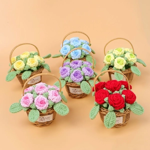 Detailed close-up of six colorful handmade crochet rose baskets with Lovely bear tags