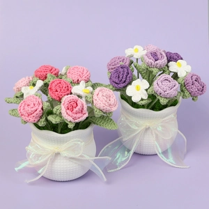 Detailed handmade crochet rose bonsai with white ceramic pots and ribbon bows