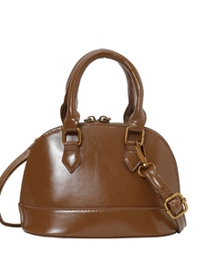 Classic brown glossy mini shell handbag with top handles and adjustable shoulder strap