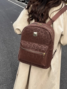 Fashionable leopard print backpack with gold zipper and large capacity for women