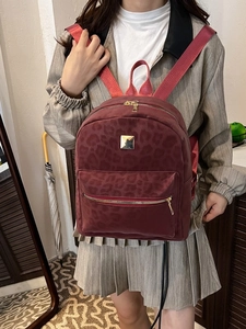 Fashionable burgundy leopard pattern backpack with gold hardware and large capacity storage