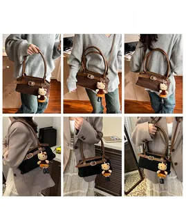 Detail shots of retro shoulder bag with velvet texture and cute plush charm accessory