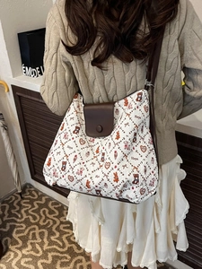 Retro women's quilted tote bag with cute animal prints and brown leather shoulder strap