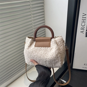 Chic sherpa patchwork handbag with wooden handles and leather strap for women
