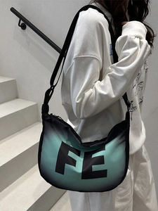 Stylish gradient black and green crossbody bag with FE letter print and nylon strap