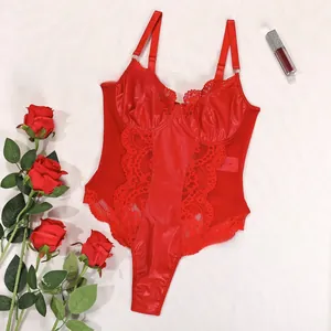Detailed flat lay of red lace and faux silk bodysuit with delicate floral rose accents