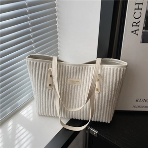 Borsa tote minimalista in velluto a coste beige con cinturini in pelle per il pendolare quotidiano