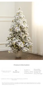Detail of pre-lit PE flocked Christmas tree showing snow effect and warm LED lighting