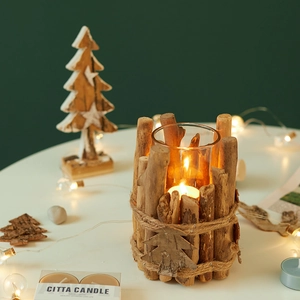 Rustic wooden candle holder with twine wrap and Christmas tree tag for holiday decor