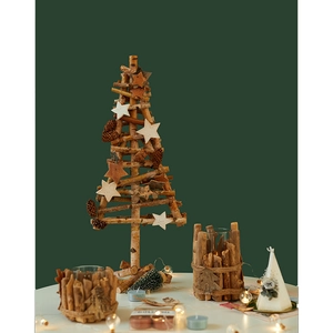 Rustic wooden Christmas tree with star pinecones and natural wood log candle holders