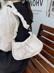 White ruched cloud shoulder bag with pearl chain and glossy finish for women
