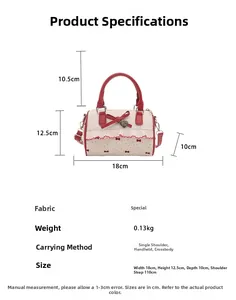 Detailed size specifications of the polka dot mini Boston bag with bow and ruffles