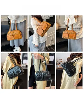 Detailed views of vintage monogrammed shoulder bag with double front flap pockets